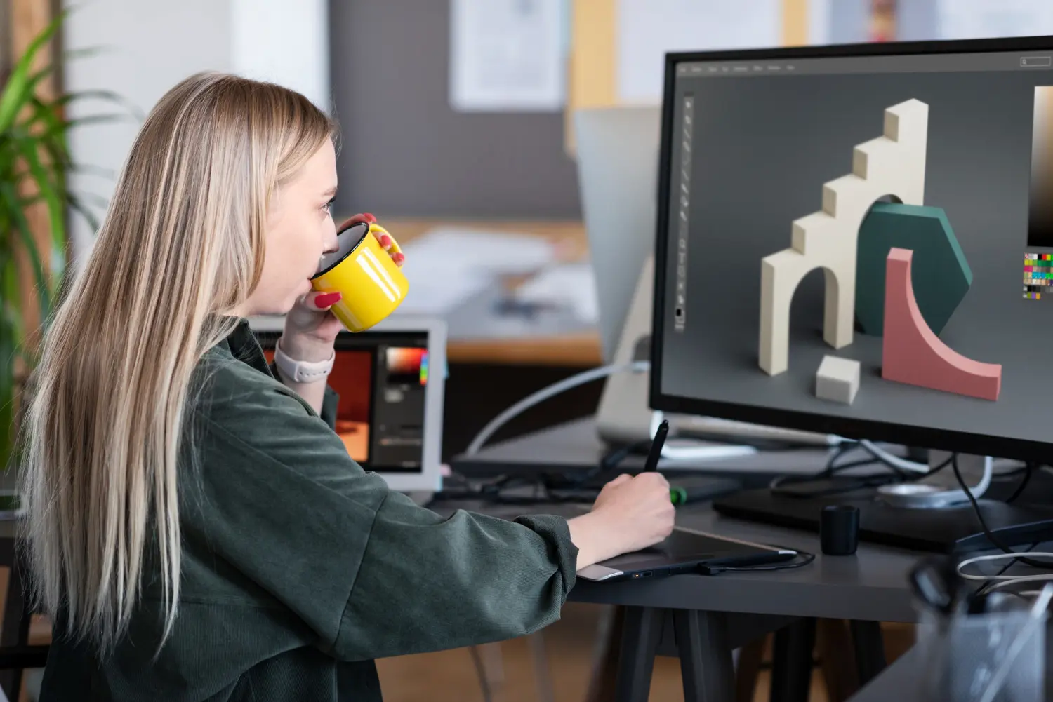 A woman working on 3D modeling